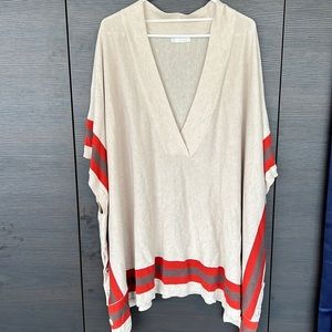 Hinge cream Poncho with red and brown stripes